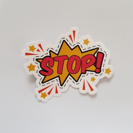 A label with a comic book style script saying "Stop!"
